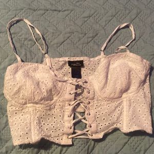It’s a cute, small, lace crop top that goes with anything.